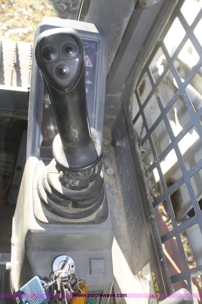 image for item O9871 2004 Takeuchi TL130 skid steer