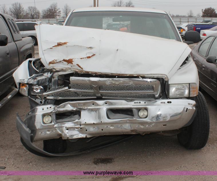 image for item O9378 2000 Dodge Ram 1500 Quad Cab pickup truck