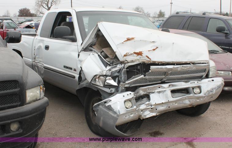 image for item O9378 2000 Dodge Ram 1500 Quad Cab pickup truck