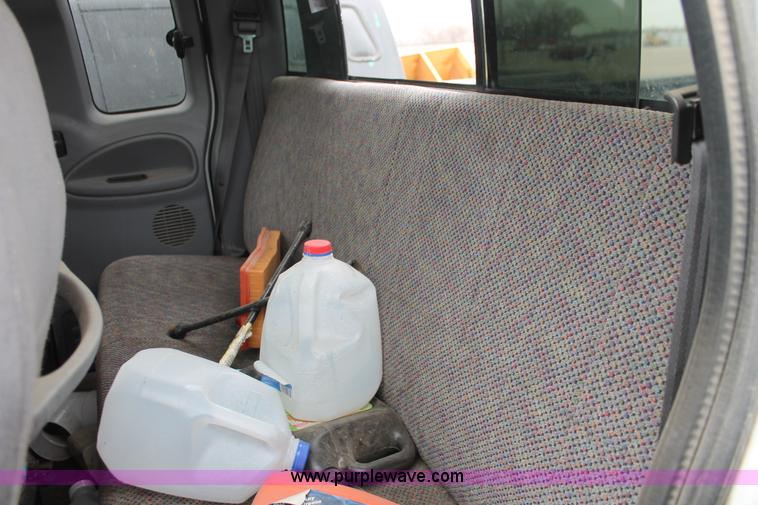 image for item O9378 2000 Dodge Ram 1500 Quad Cab pickup truck