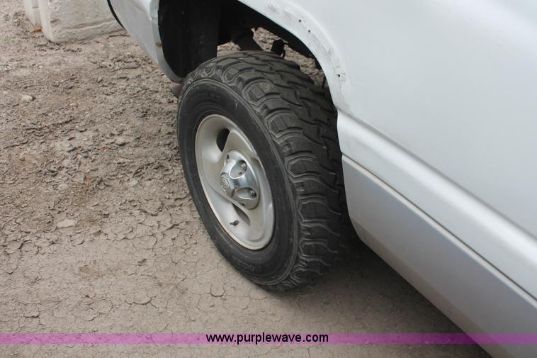 image for item O9378 2000 Dodge Ram 1500 Quad Cab pickup truck