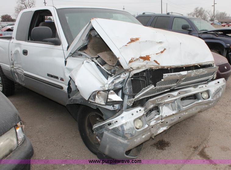 image for item O9378 2000 Dodge Ram 1500 Quad Cab pickup truck