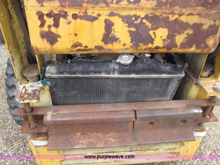 image for item E7501 Ford skid steer