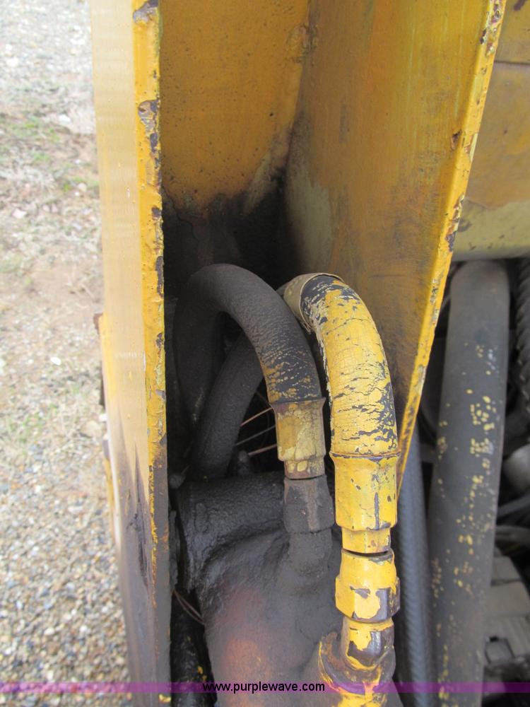 image for item E7501 Ford skid steer