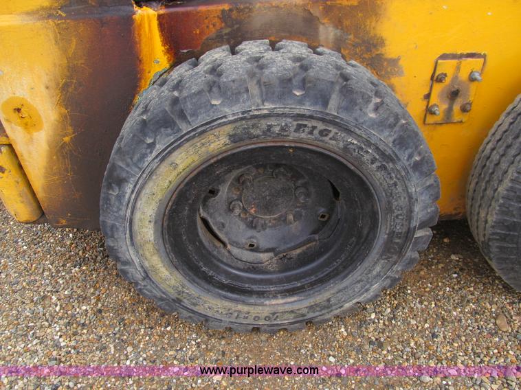 image for item E7501 Ford skid steer