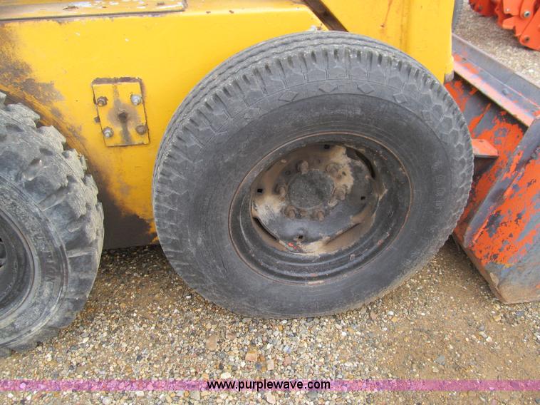 image for item E7501 Ford skid steer