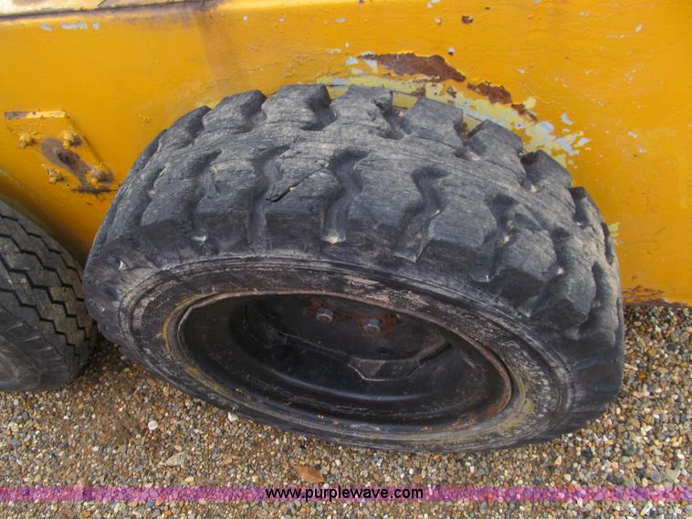 image for item E7501 Ford skid steer