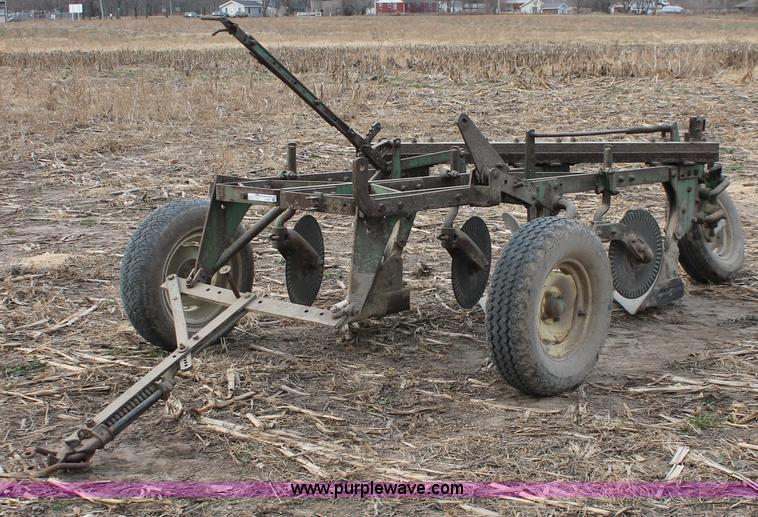 image for item O9431 John Deere three bottom plow