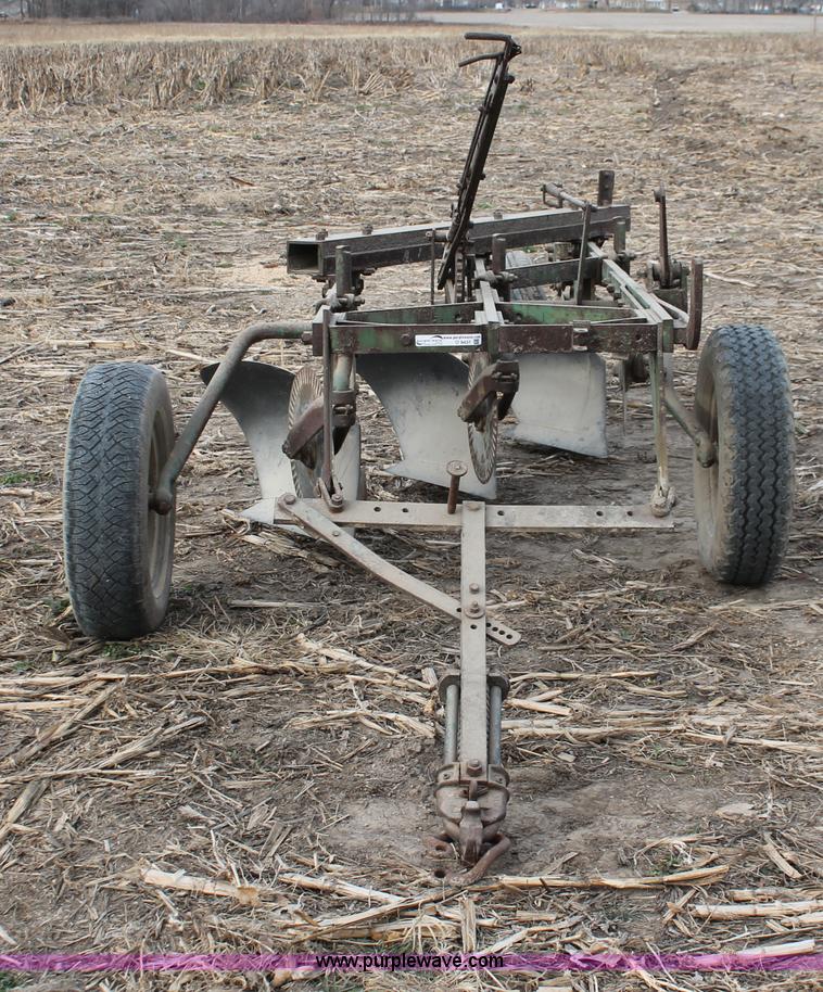 image for item O9431 John Deere three bottom plow