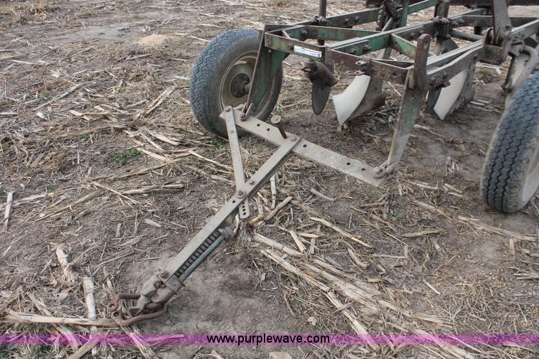 image for item O9431 John Deere three bottom plow