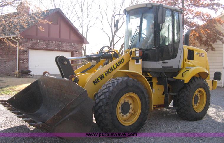 image for item B8469 2006 New Holland W110 wheel loader