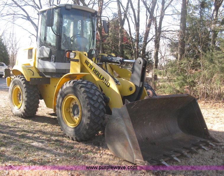 image for item B8469 2006 New Holland W110 wheel loader