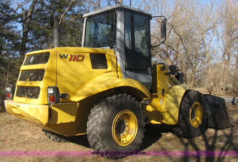 image for item B8469 2006 New Holland W110 wheel loader