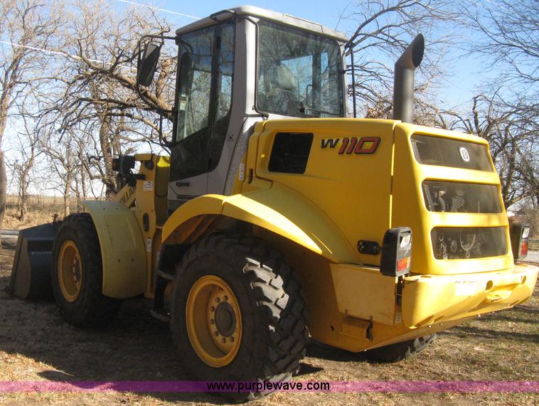 image for item B8469 2006 New Holland W110 wheel loader