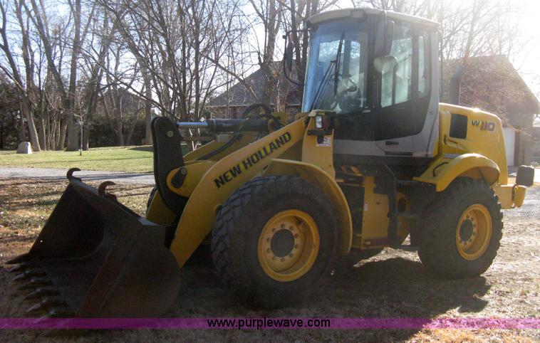 image for item B8469 2006 New Holland W110 wheel loader