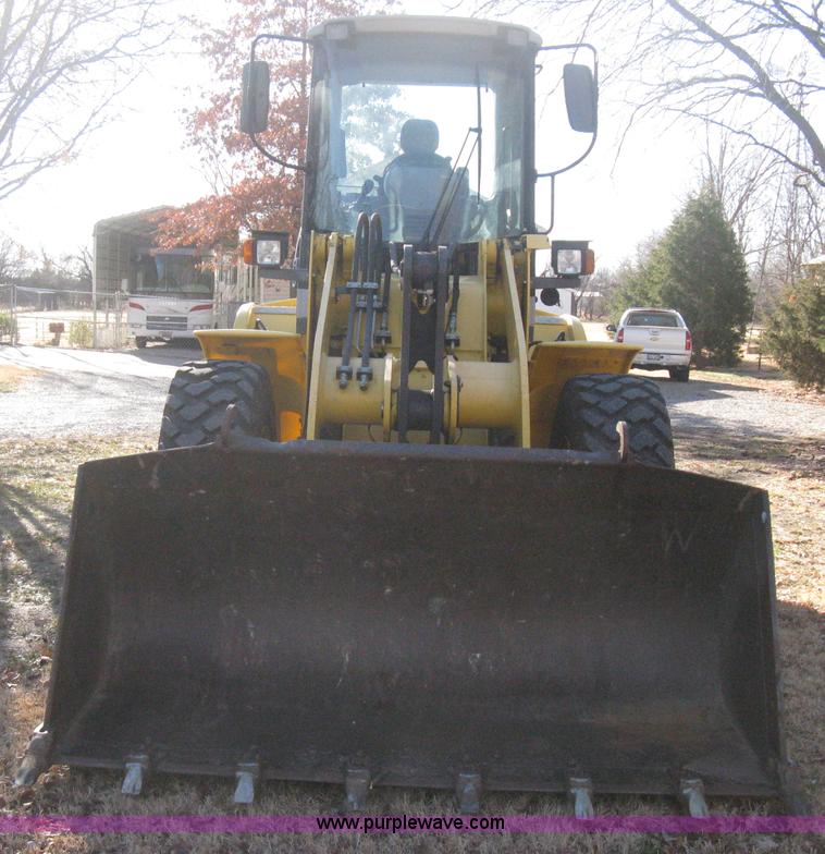 image for item B8469 2006 New Holland W110 wheel loader