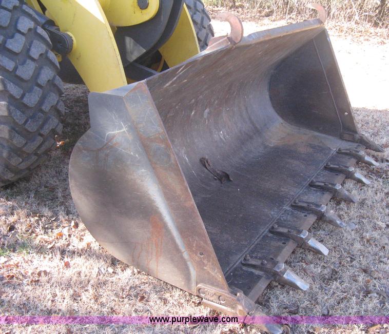 image for item B8469 2006 New Holland W110 wheel loader