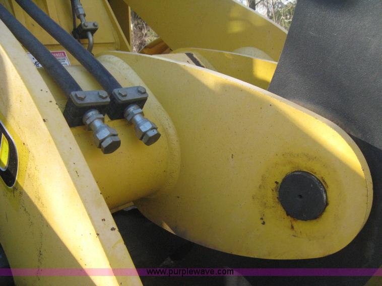 image for item B8469 2006 New Holland W110 wheel loader