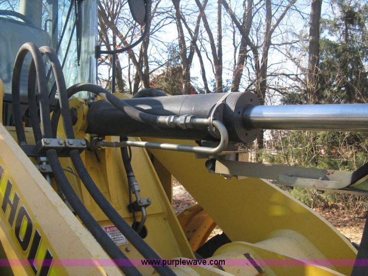 image for item B8469 2006 New Holland W110 wheel loader