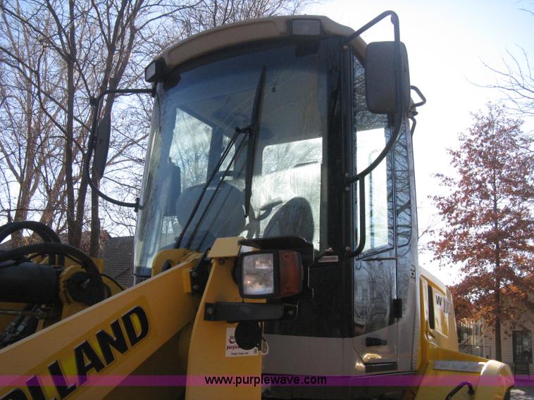 image for item B8469 2006 New Holland W110 wheel loader