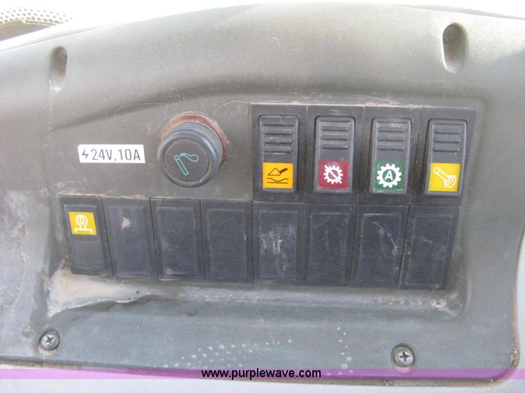 image for item B8469 2006 New Holland W110 wheel loader