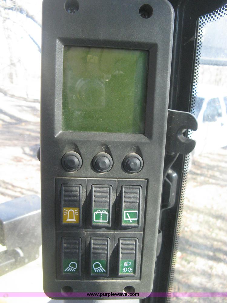 image for item B8469 2006 New Holland W110 wheel loader