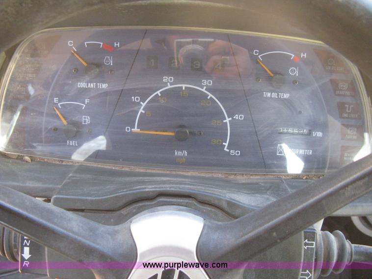 image for item B8469 2006 New Holland W110 wheel loader