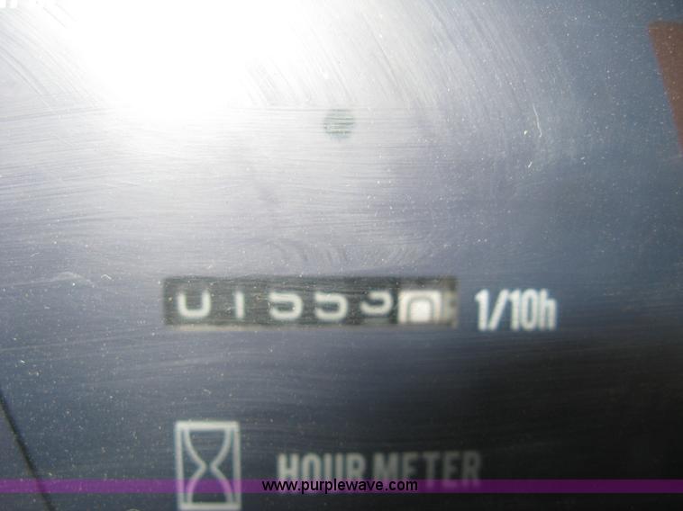 image for item B8469 2006 New Holland W110 wheel loader