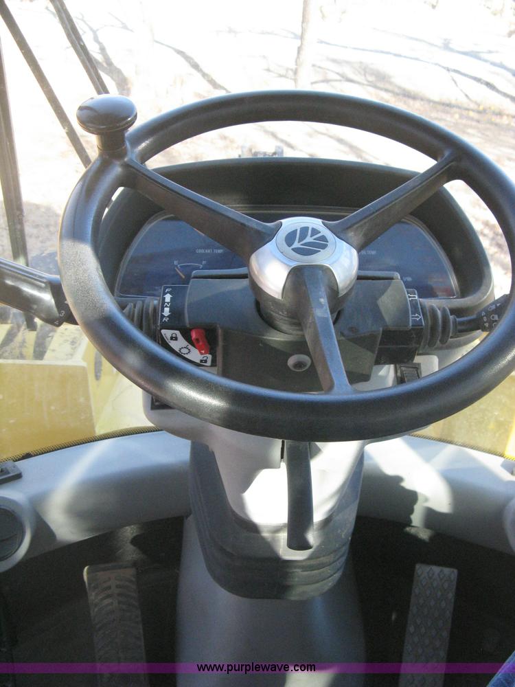 image for item B8469 2006 New Holland W110 wheel loader