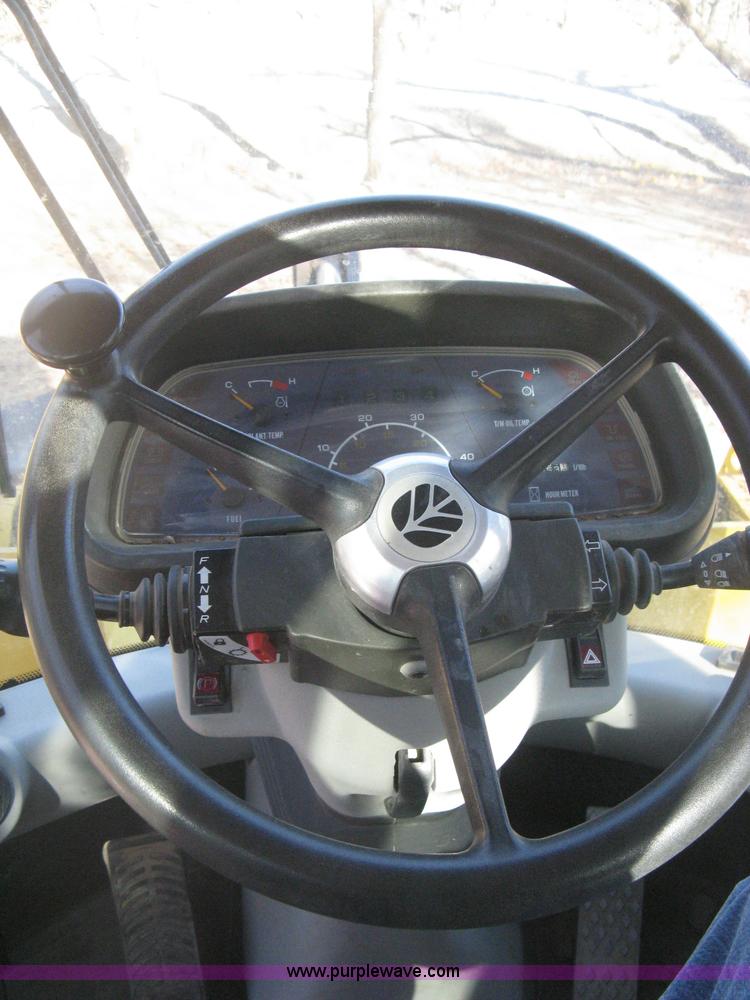 image for item B8469 2006 New Holland W110 wheel loader