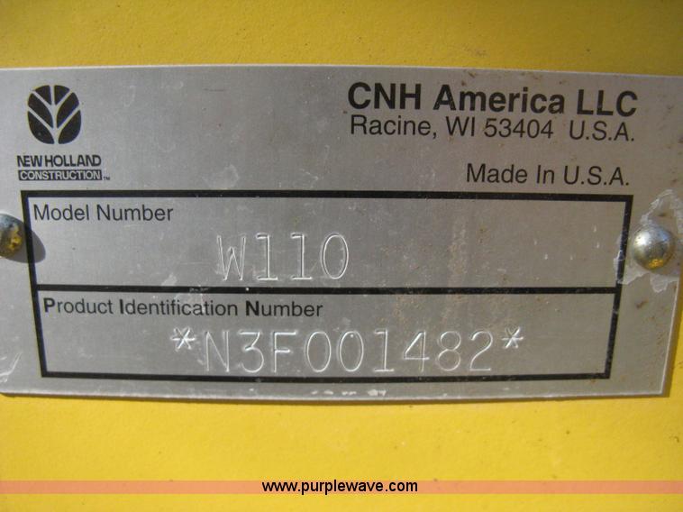 image for item B8469 2006 New Holland W110 wheel loader