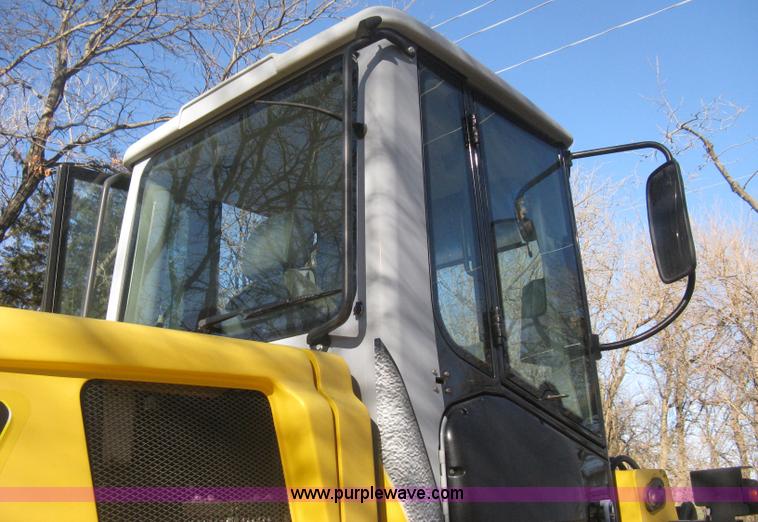 image for item B8469 2006 New Holland W110 wheel loader