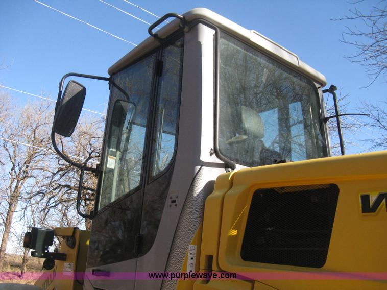 image for item B8469 2006 New Holland W110 wheel loader