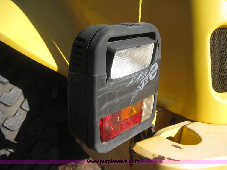 image for item B8469 2006 New Holland W110 wheel loader