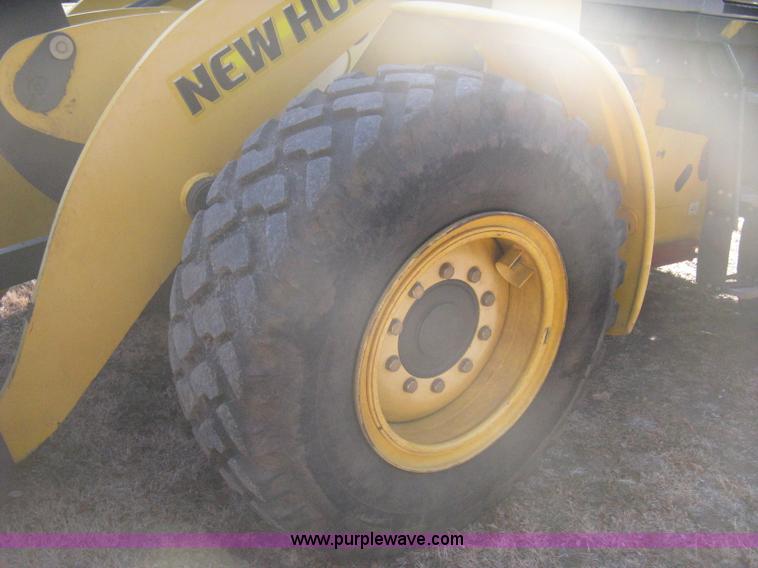 image for item B8469 2006 New Holland W110 wheel loader