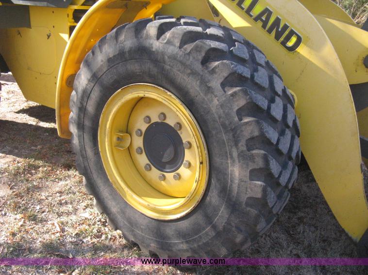 image for item B8469 2006 New Holland W110 wheel loader