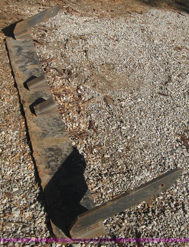 image for item B8469 2006 New Holland W110 wheel loader