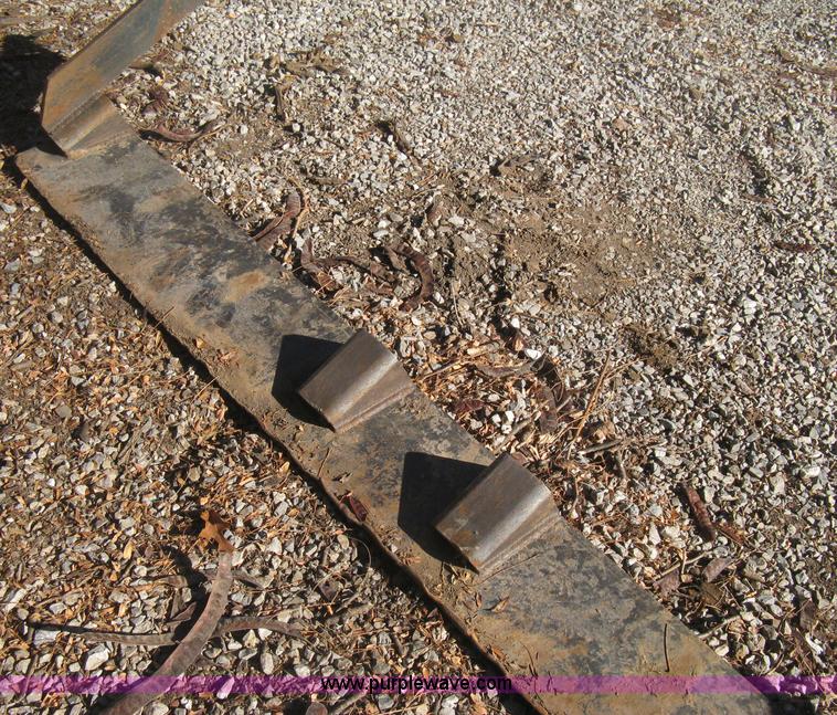 image for item B8469 2006 New Holland W110 wheel loader