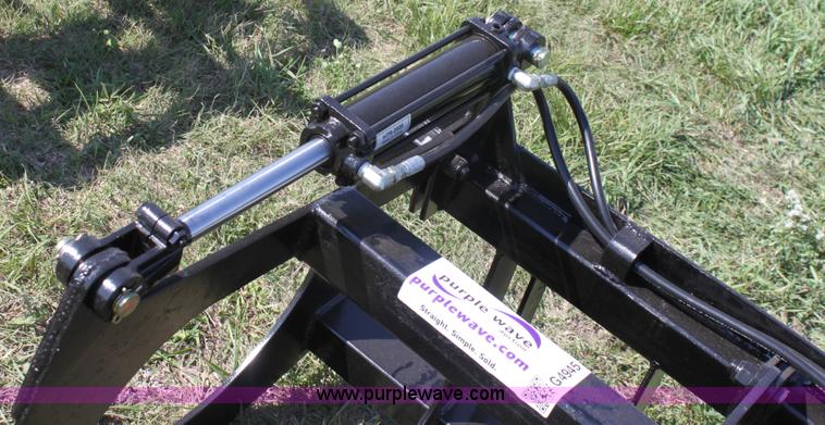 image for item H9881 Wildkat 66" root grapple skid steer attachment