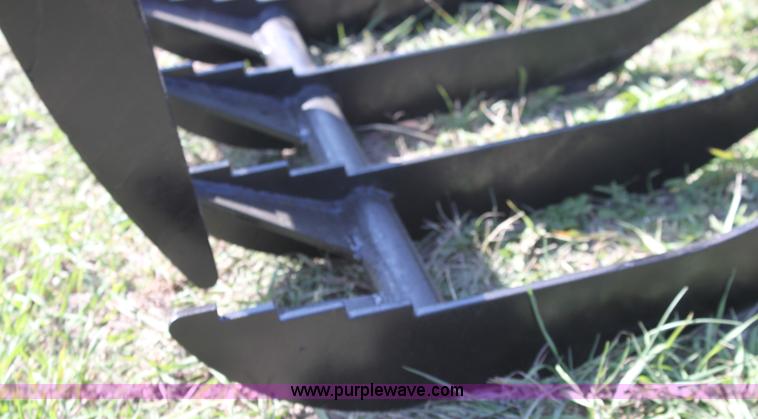 image for item H9881 Wildkat 66" root grapple skid steer attachment