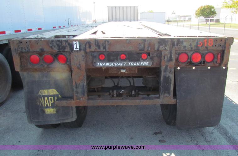 image for item E8121 1993 Transcraft 60 ton tandem axle flatbed trailer