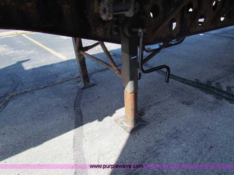 image for item E8121 1993 Transcraft 60 ton tandem axle flatbed trailer