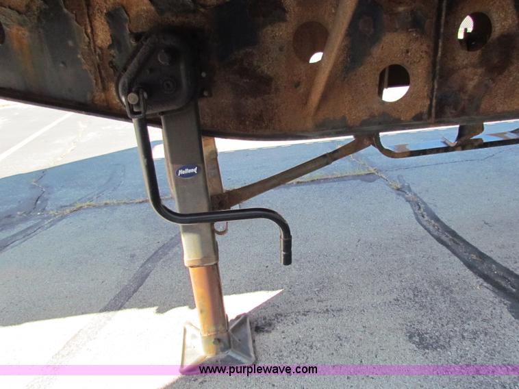 image for item E8121 1993 Transcraft 60 ton tandem axle flatbed trailer