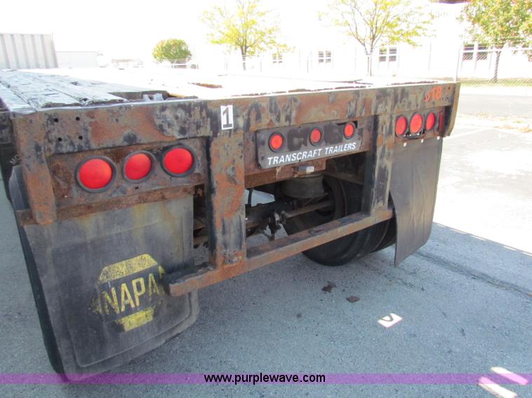 image for item E8121 1993 Transcraft 60 ton tandem axle flatbed trailer