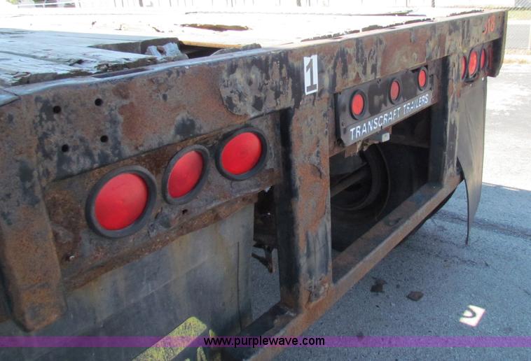 image for item E8121 1993 Transcraft 60 ton tandem axle flatbed trailer