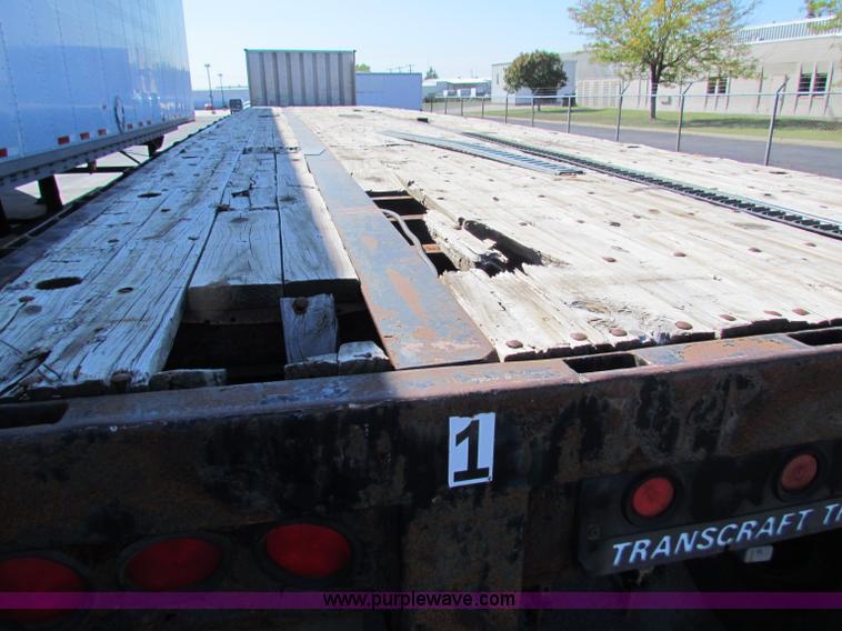 image for item E8121 1993 Transcraft 60 ton tandem axle flatbed trailer
