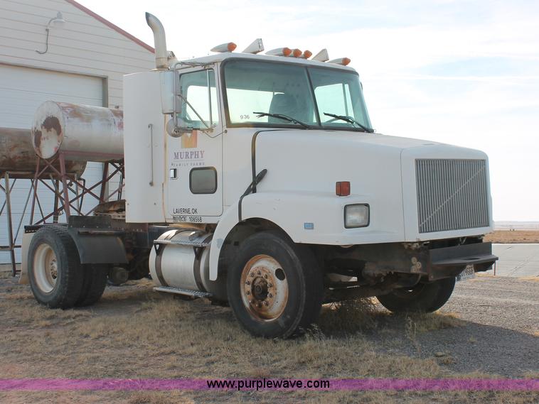image for item O9361 1990 Volvo White GMC WG42T semi truck