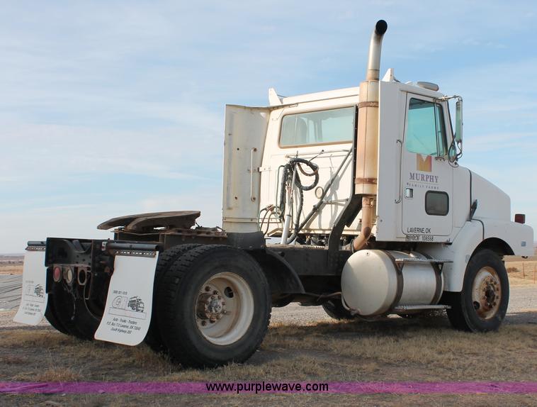 image for item O9361 1990 Volvo White GMC WG42T semi truck