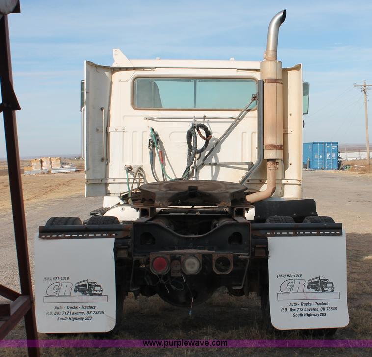 image for item O9361 1990 Volvo White GMC WG42T semi truck