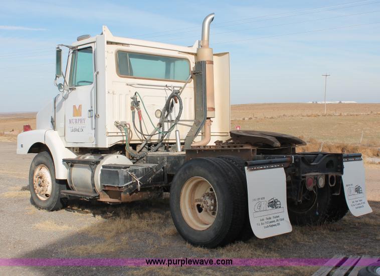 image for item O9361 1990 Volvo White GMC WG42T semi truck